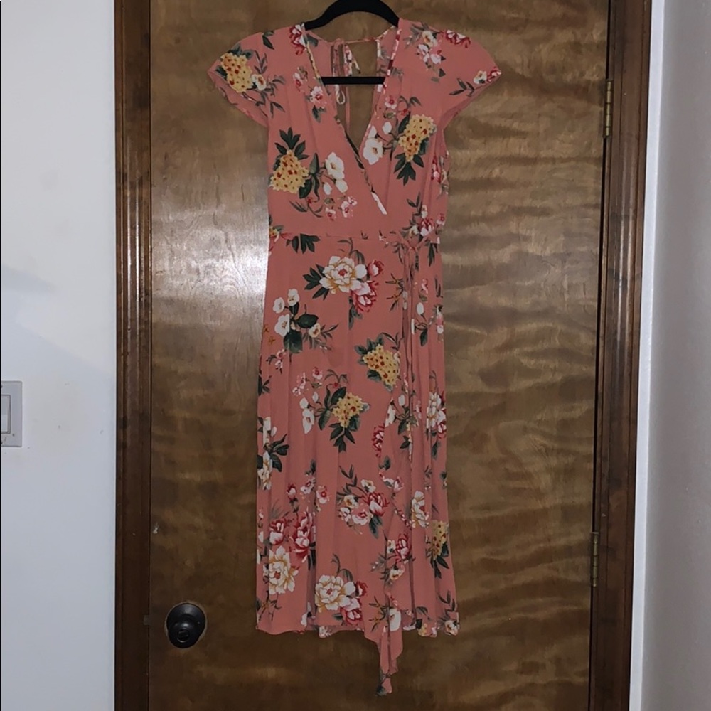 Pink floral knee length dress.